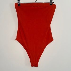 Strapless orange bodysuit